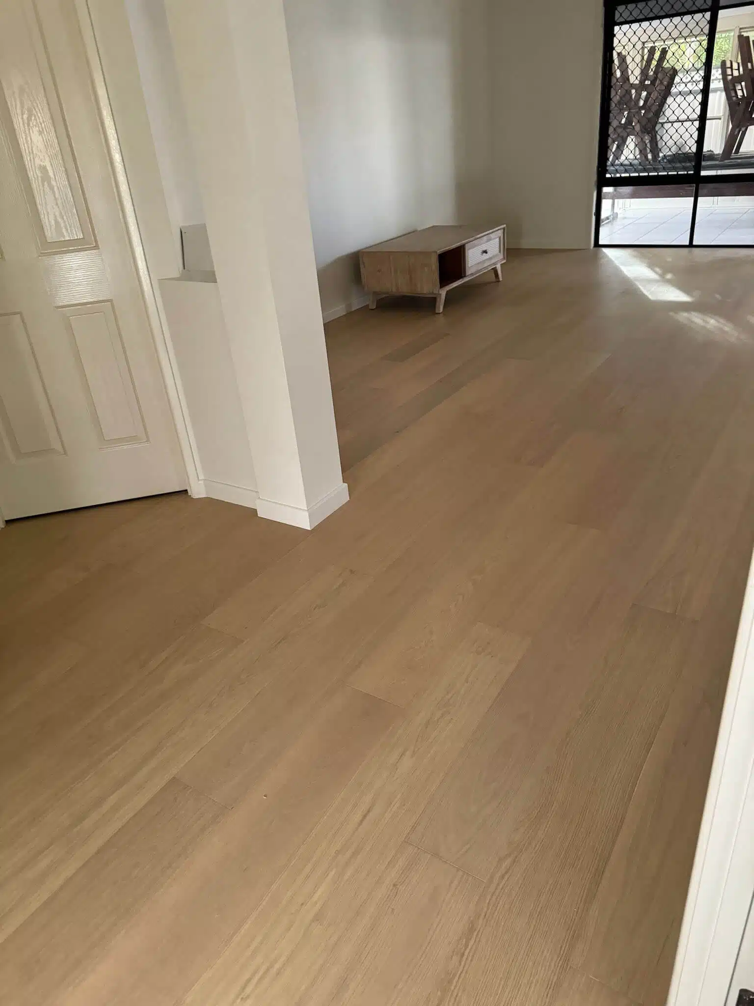 Floor with door Understanding Engineered Flooring Cost: Key Factors You Need to Know